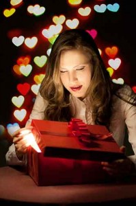 Woman opening Valentine's Day gift